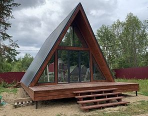 Треугольный дом